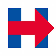 希拉里·克林頓 (Hillary Clinton) H 標誌在她的大部分競選活動中都出現過,兩根藍色柱子兩側交叉著一個紅色箭頭以完成字母